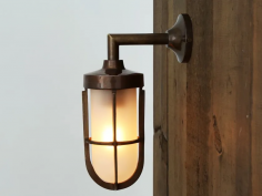 Cladach brass well glass wall light